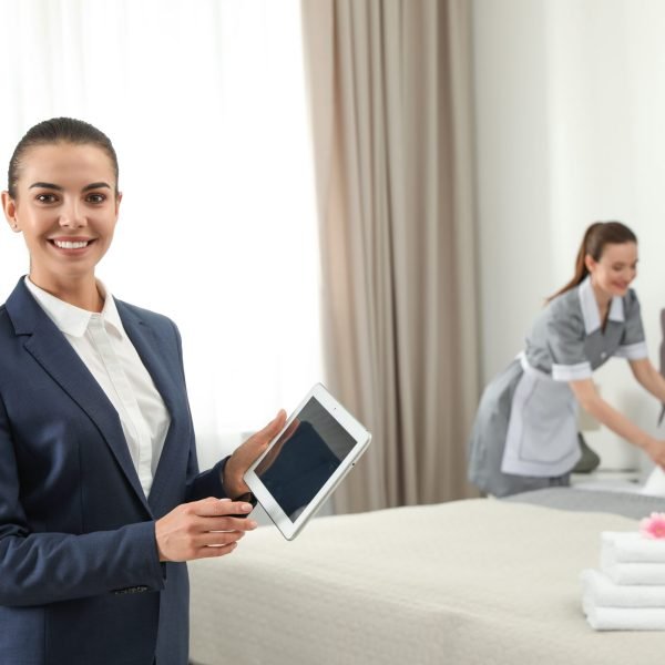 Housekeeping,Manager,With,Tablet,Checking,Maid,Work,In,Hotel,Room.